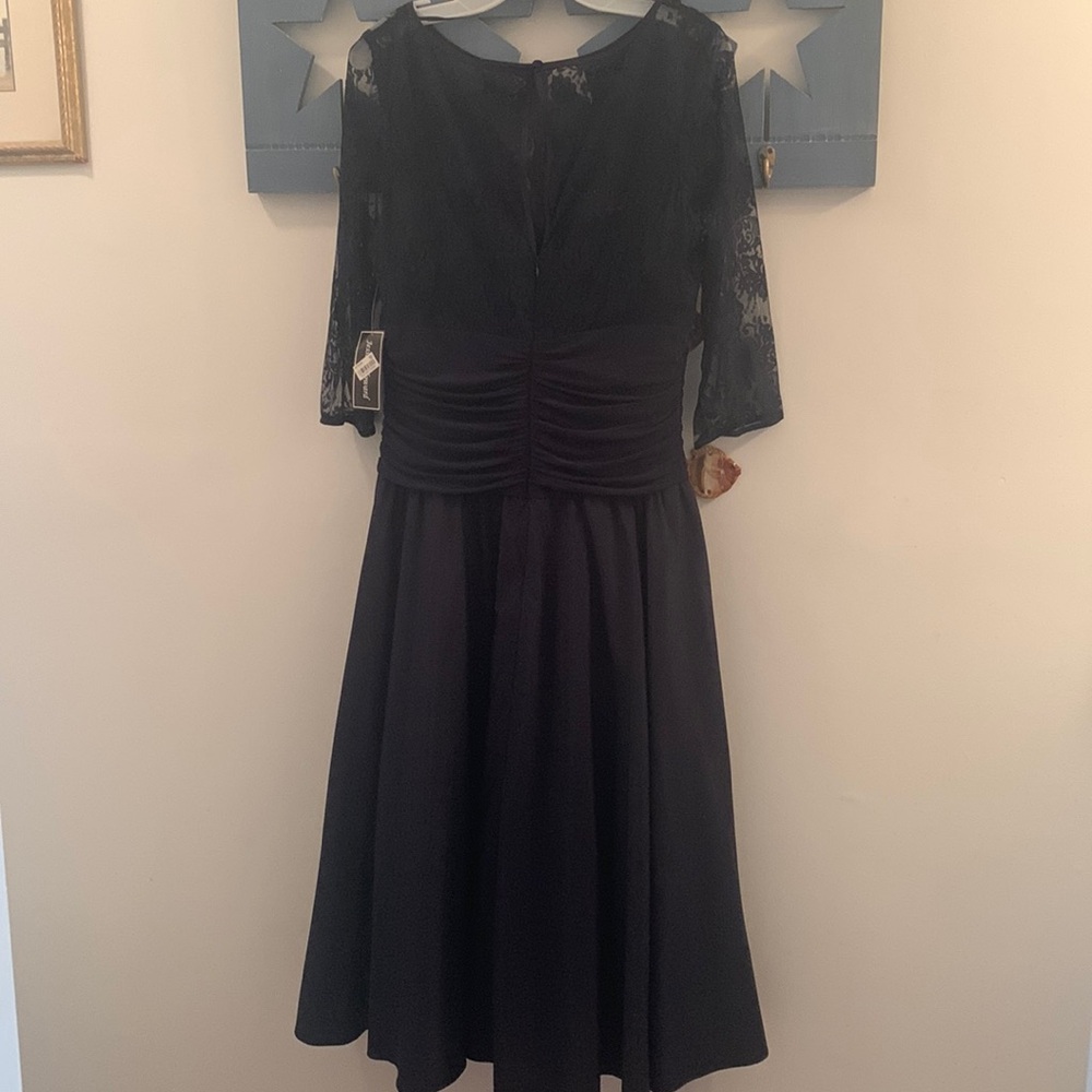 Never NWT been worn, navy blue, lace cocktail dress